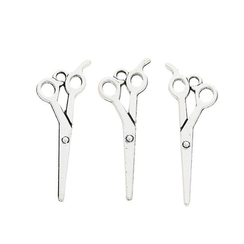 Grouped front and back views showing the details of hairdressing scissors charms