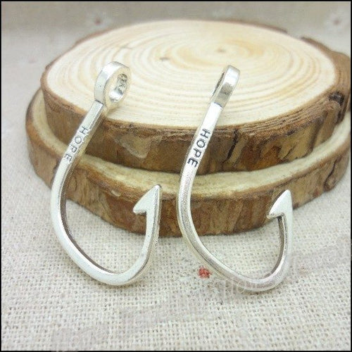 Close view of the fish hook connector front and reverse
