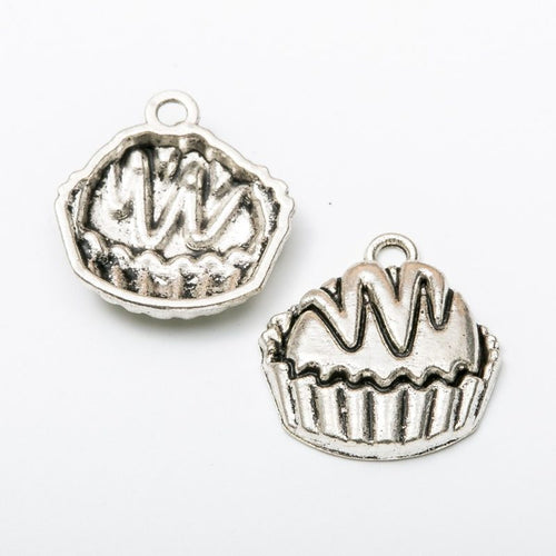 Closer view of the frosted cupcake charm surface and hanging loop