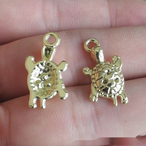 Alternate image of turtle charm showing available finishes and form