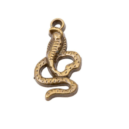 Close product view of the coiled cobra snake metal charm in two antique finishes