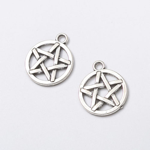 Close view of the round framed pentagram showing an open five-point star inside a circular rim