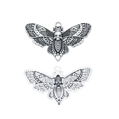 Alternate product view of moth charms on a white background