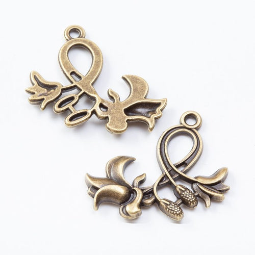 Flower charms with flared trumpet blooms and curling stems shown from the front on a white background.