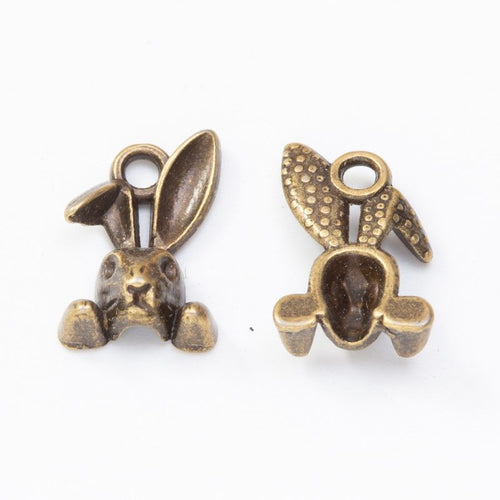 Antique Bronze, Antique Silver rabbit head charm shown in a detailed product view