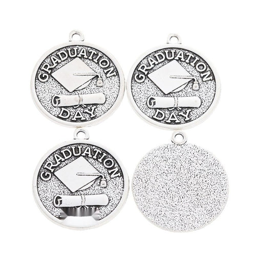 Graduation Day Medal metal charm shown in a second product arrangement