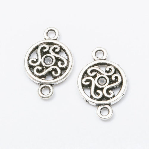 Close-up view of the round swirl double loop metal connectors in three finishes showing its front and reverse metal deta