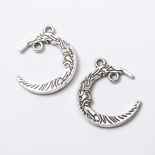 Close product view showing the front and reverse details of the crescent moon connector