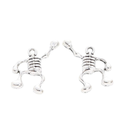 Metal articulated skeleton charm, front detail shown in the product image