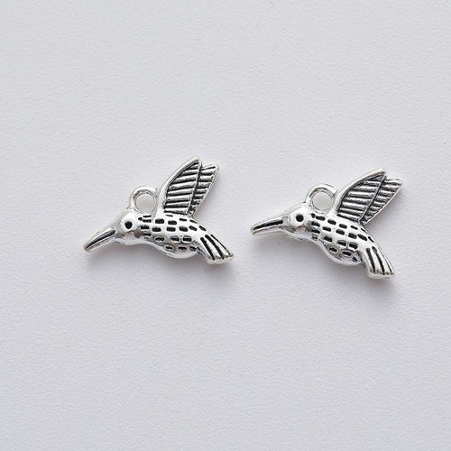 Flying Hummingbird Charm front and reverse details on a white background