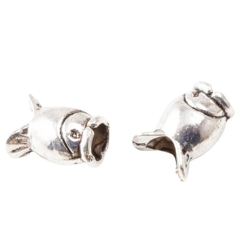 Closer view of the three-dimensional fish bead with a large threading hole