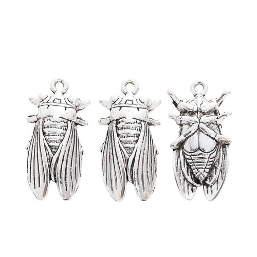 Grouped cicada components showing repeated front details and finish