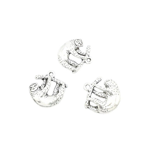 Close view showing the front and reverse details of the koala charm