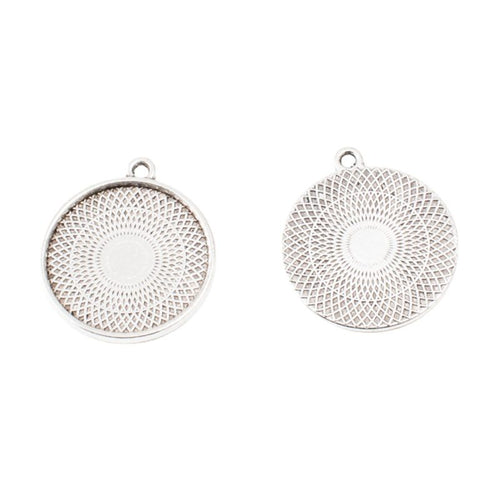 Round 20mm Cabochon Bezel Pendant Trays shown in a angled detail view on a plain background