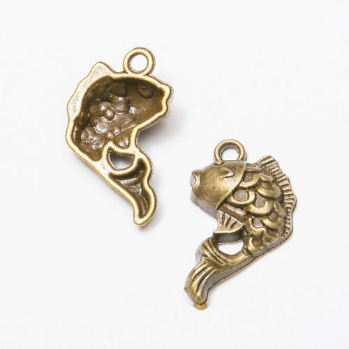 Closer view of the fish-shaped charm surface and hanging loop