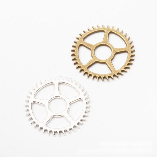 Openwork Gear Charm in an antique tone shown from the front