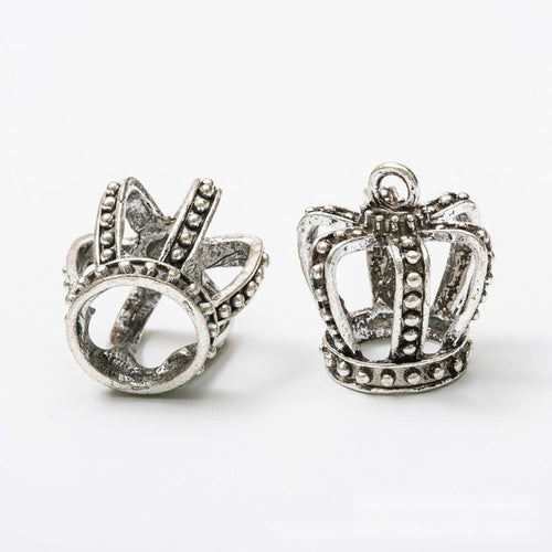 Antique Bronze, Gold Tone, Antique Silver openwork crown charm shown in a detailed product view