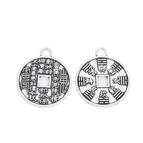 Grouped front and back views showing the details of yin yang coin charms