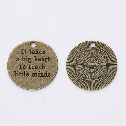 Front detail view of the Teacher Quote Disc metal piece