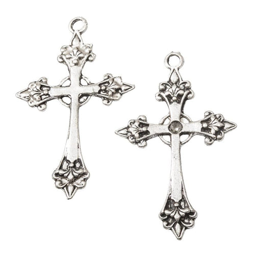 Front detail and finish comparison of the ornate fleur cross charm