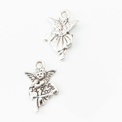 Front detail of small winged angel figure with raised details and a top loop