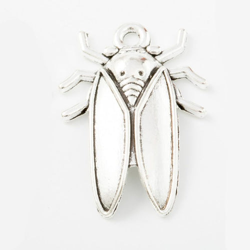 Angled detail views of cicada charms