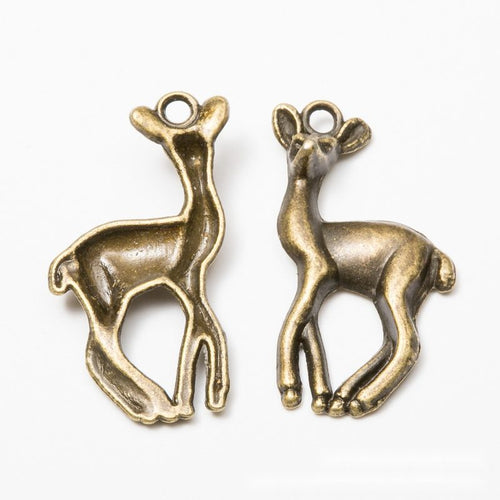 Front and reverse details of the slender deer metal charm pendant