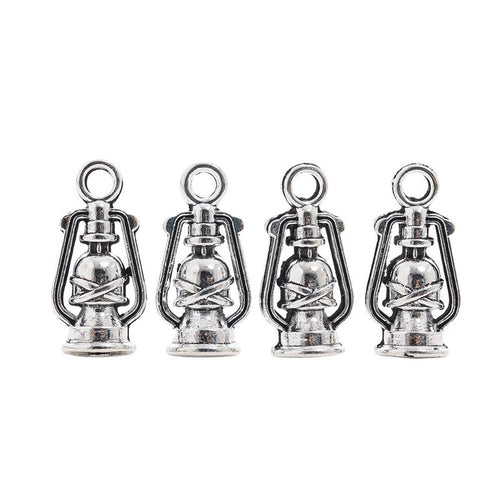 Closer product view of miniature kerosene lantern charm shown against a plain background.
