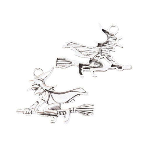 Flying Witch Charm shown from the front in contrasting finishes