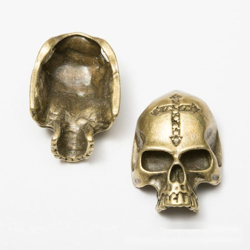 Additional front and reverse view of the cross-detail skull bead