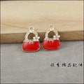 Gold Tone Handbag Charm with Flower and Four Enamel Colors view 2