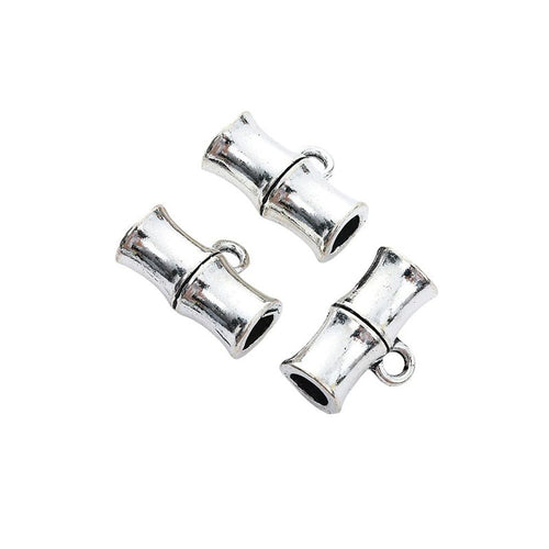 Grouped view of the bamboo shape three way bail bead from the front