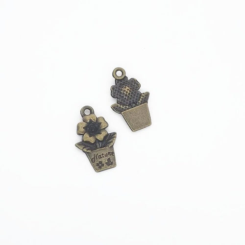 Detailed view of small flower pot metal component