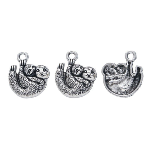 Close front and reverse view of the metal curled koala charm