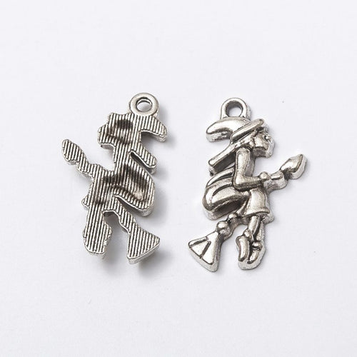 Closer view of the flying witch charm surface and hanging loop