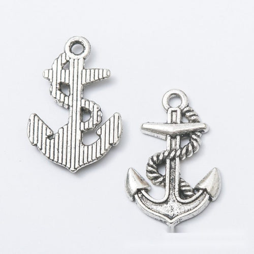 Close product view of the rope wrapped anchor metal charm in two antique finishes