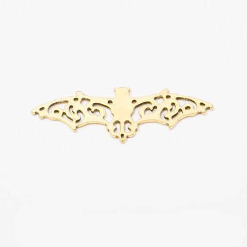 Close view of the front details on filigree bat wing connectors