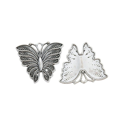 Grouped engraved butterfly components showing repeated front details and finish