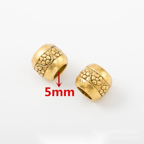 Assorted Gold Tone Large Hole Beads showing front details and finish