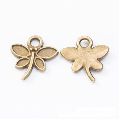 Front and reverse details of dragonfly charms on a white background