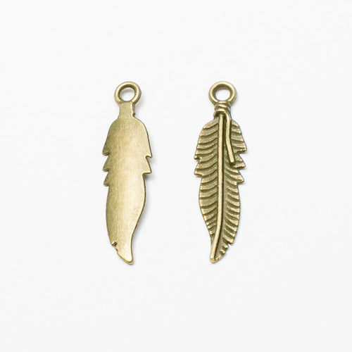 Feather Charm Pendant front detail showing a curved central quill and layered barbs
