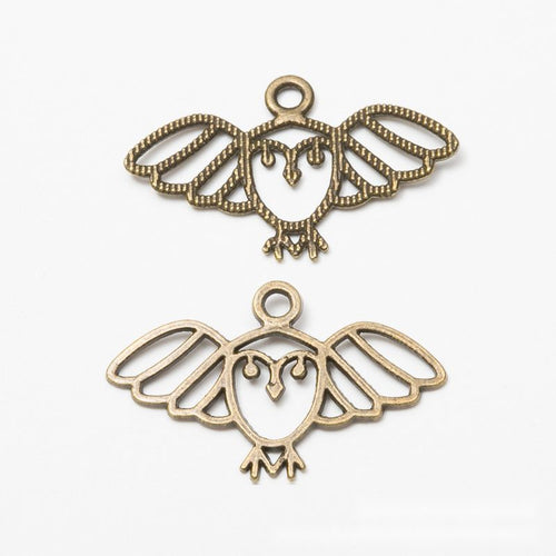 Alternate image of wide owl charm showing available finishes and form