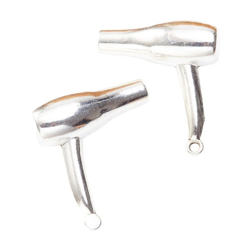 Front detail of hair dryer metal charm