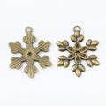 Detailed Six Arm Snowflake Charm In Antique Bronze and Antique Silver Metal Finish view 2