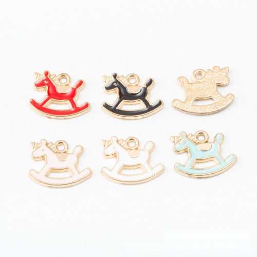 Assorted rocking horse finishes arranged on a white background