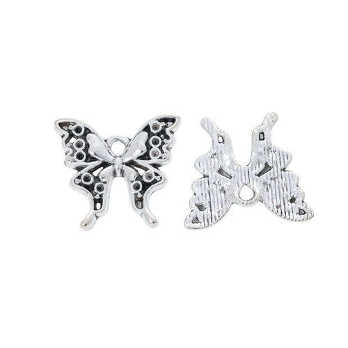 Grouped openwork butterfly components showing repeated front details and finish