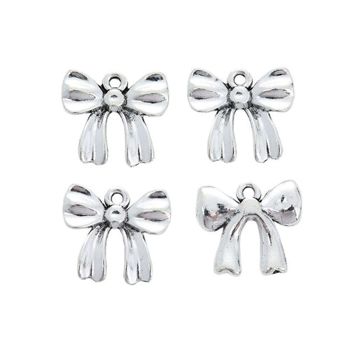 Grouped classic ribbon bow components showing repeated front details and finish