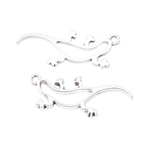 Long lizard-shaped open frames with curled feet and tails shown from the front on a white background.