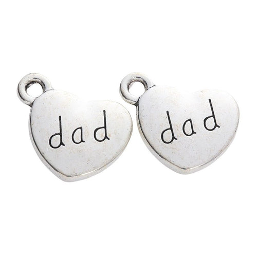 Front detail view of the Dad Engraved Heart metal piece