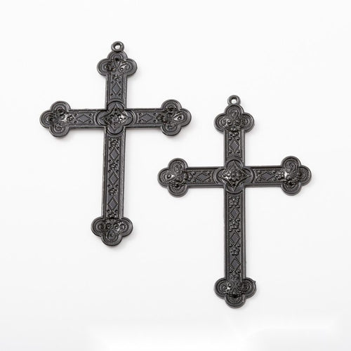Close view of Assorted Black Cross metal shape and surface detail